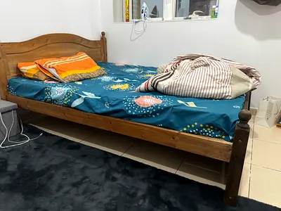 Solid wood single bed frame with headboard - good condition
