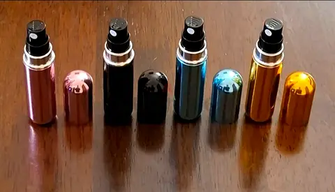 4 Portable Mini Refillabe Perfume Atomizer Bottles ٤ أنبوبة تعبئة عطر