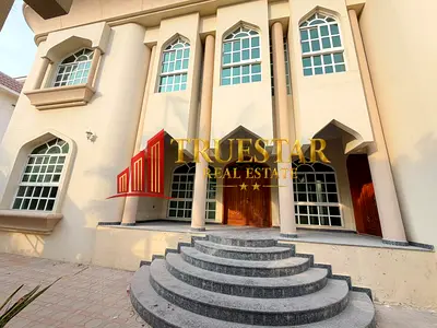Spacious 6-Bedroom Family Villa in Al Badaa: Separate Living/Dining & Private Garden