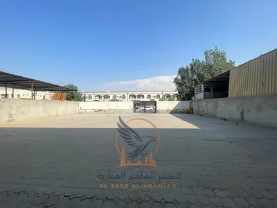 حوش للإيجار في الجرف الصناعية 3  عجمان | 5,000 قدم مربع | كهرباء 30 كيلوواط | شارع رئيسي