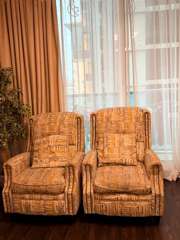 Pair of comfortable pattern armchairs - good condition