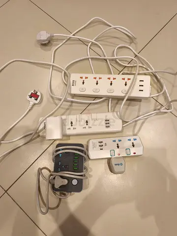 Bundle of used power strips, USB chargers and adapters