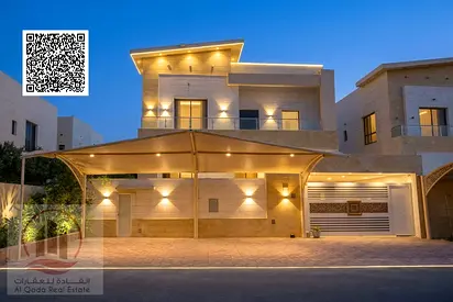 Villa for sale in Al Yasmeen, Ajman. 5 master bedrooms, a majlis, a living room, and a maid's room. Freehold ownership - with bank financing options.