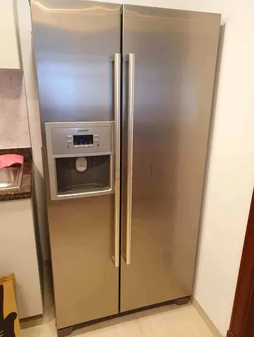 Siemens side by side fridge and freezer new model slightly used with ice maker water dispenser