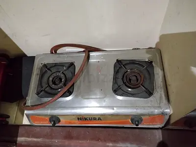 Nikura Japan 2-Burner Gas Stove with Hose and 11kg LPG Gas Cylinder with it.