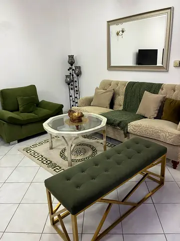 Sofa set with mirror and rug