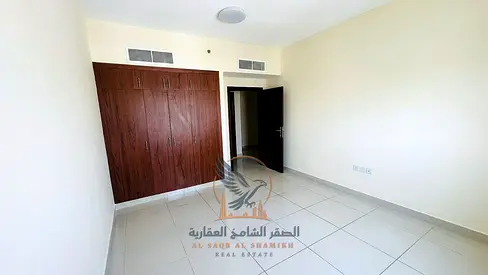 Ajman, Khalifa Street: One bedroom and living room for annual rent, with gym and balcony. Excellent finishing.