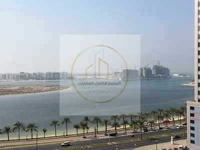 Annual 1 bedroom apartment for rent in Al Qasba Sharjah with free AC gym pool balcony open view built in wardrobes master bedroom and prime location