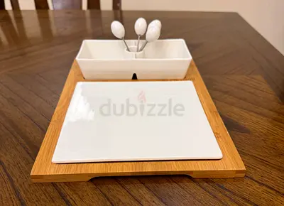 Bamboo Serving Tray with Ceramic Dishes and fork.
