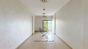 Lowest-priced 3-bedroom apartment with a living room in Ajman, featuring 4 balconies and 3 bathrooms