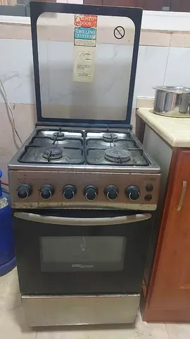 Used 4-Burner Gas Cooker with Oven - Good Working Condition