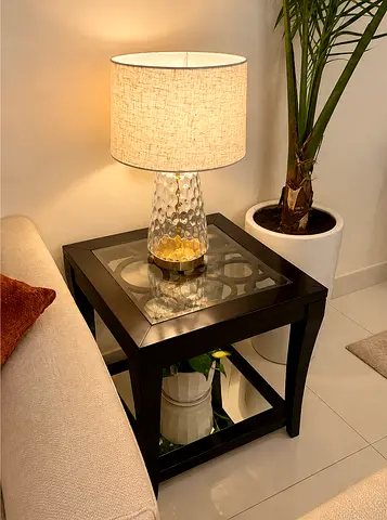 Dark wood glass-top side table / end table in good condition