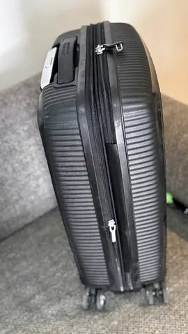 Black hard-shell 4-wheel carry-on suitcase - good condition