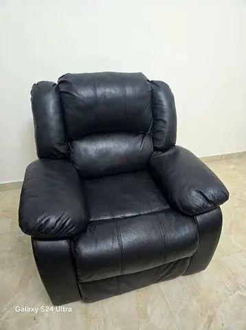 Used black leather single recliner armchair - comfortable, good condition