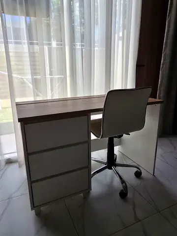 Work desk and chair for sale. Worth 1000 dhs. With back cable grommets.