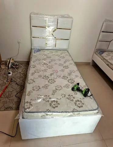 Single bed with mattress and upholstered headboard - good condition