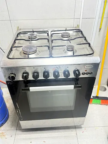 Used 4-burner freestanding gas stove with oven - good working condition