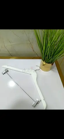 White wooden hanger with clips for skirts/trousers - like new