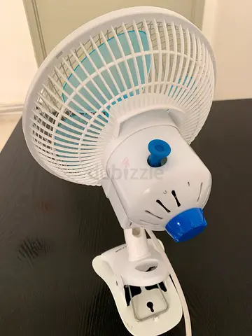 Portable clip-on desk fan — compact, adjustable, good condition