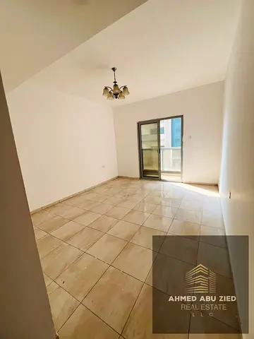 A distinguished family apartment for annual rent in a quiet and clean family building in Al Rashidiya 1, Ajman, in a vibrant and strategic location di
