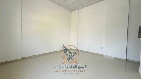 For annual rent in Ajman first occupancy, one bedroom and living room in a new building in Al Rashidiya 2 Central air conditioning two bathrooms