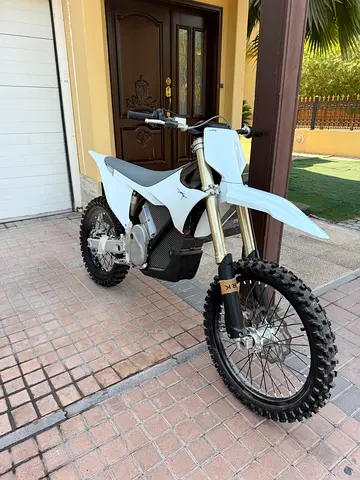 Off-road dirt bike front wheel and fork - used, good condition