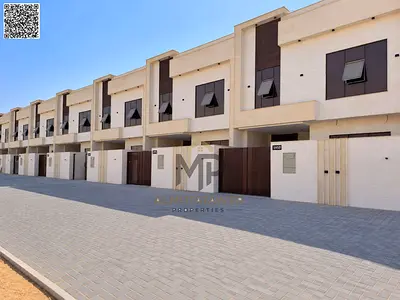 Townhouse (on main road) for sale at ajman| al helio2 | 5 master rooms,majlis,hall,roof| freehold| the price including every thing.