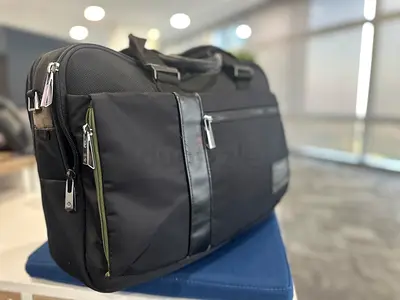 Black laptop briefcase with multiple compartments, gently used