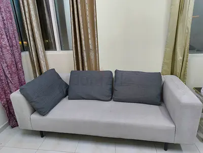 Light grey 3-seater sofa with dark grey cushions - good condition