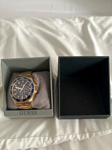 GUESS men's gold-tone chronograph watch with original box purchased for $429 AUD willing for 650 aed