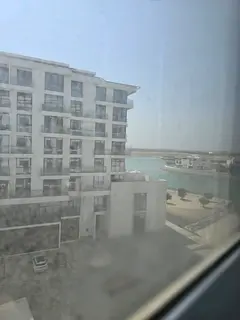Studio for annual rent in Al Hamriyah, Blue Bay Project, with stunning sea views in a beautiful, pea