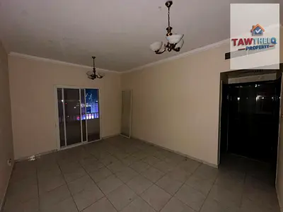 1-bedroom and living room with a balcony in Al Nuaimiya 2, King Faisal Street – spacious layout.