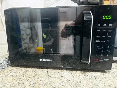 Nikai countertop microwave oven - good working condition