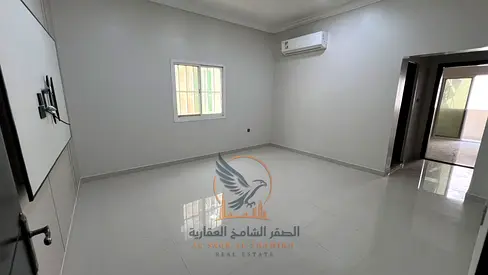 Two-bedroom apartment with a living room in Ajman, Al Muwaihat 1, in a new building, with an excellent area and a balcony.
