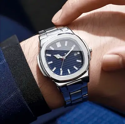 Luxury Silver Stainless Steel Watch with Blue Dial – Nautilus Style (Delivery Available)