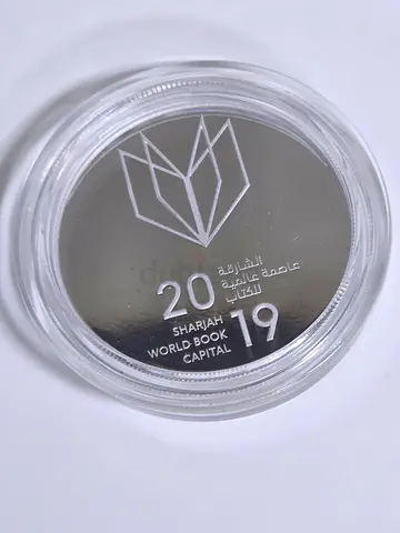 Uae silver coin ,sharjah book. with box. And coa.