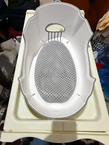 Baby bathtub with changing station - sturdy and clean