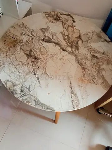 Round marble-look dining table with wooden legs - good condition