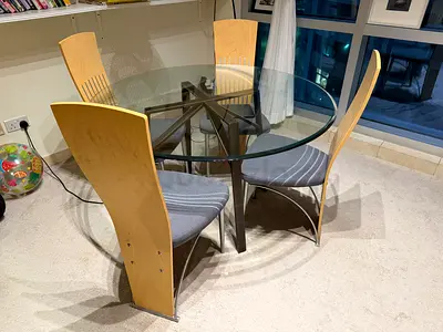 Glass top table with chairs set