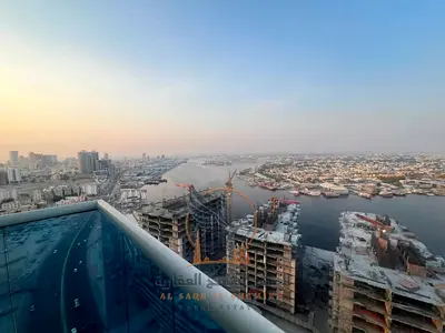 شقة غرفتين وصالة للإيجار بأبراج الواحة عجمان إطلالة بحرية بلكونتين جيم مسبح وباركن خاص