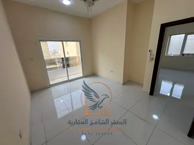 For annual rent in Ajman first occupancy one-bedroom apartment with a living room excellent space, brand new with a balcony and open view