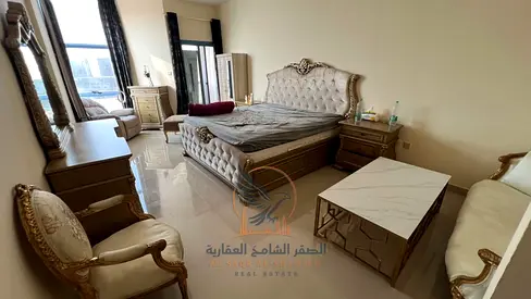 Furnished 2BR master apt, yearly rent, parking, hotel-style furniture, big kitchen, balcony. Next to Al Hikma School. Great price.