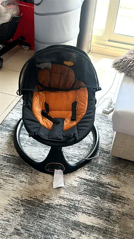 Electric baby rocker/rocking seat with canopy — gently used