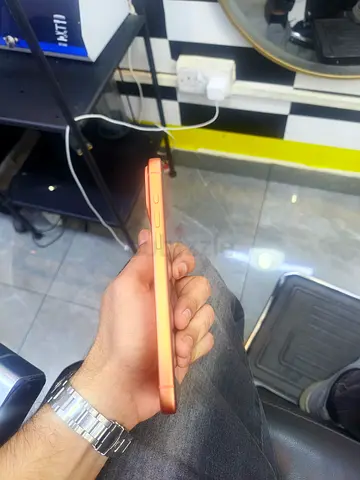 iPhone 12/13/14-style Orange (Side View) - Good Condition