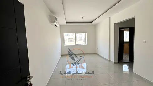 عرض حصري شقة وغرفة وصالة مع بلكونة في النعيمية شارع الكلية وقريبة من سفير مول بموقع استراتيجي وجاهزة تماما لتوفر لك ولعائلتك السكن المريح