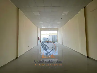 معرض 1550 قدم² بالجرف الصناعية 2 على شارع رئيسي مع ميزانين وفاير سيستم حديث