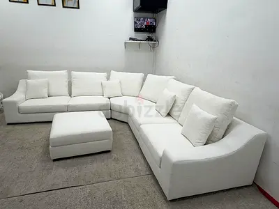Brand New condition indigo brand corner sofa with footstool