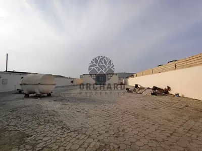 Open yard 20000 sqft with 11 labour rooms one close shed fully interlock rent 400k