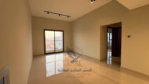 1-Bedroom Apartment (First Occupancy) at an Attractive Price in Al Nuaimiya | Master Bedroom Balcony with an Open View
