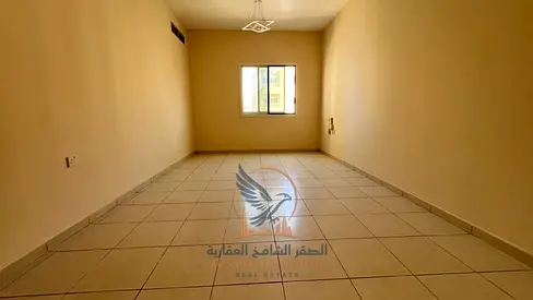 Spacious 2-bedroom apartment on Khalifa Street with a balcony and 1 month free.